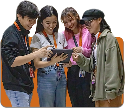 four-people-looking-at-a-tablet